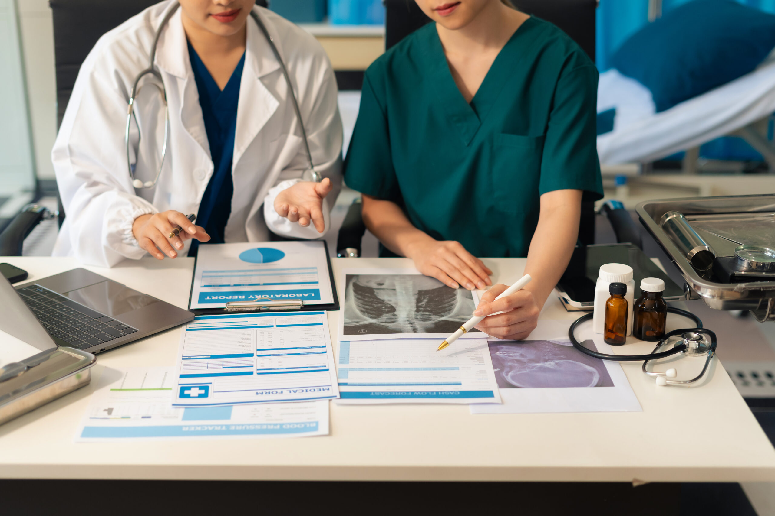 Medical team working analyzed the results of medical reports.